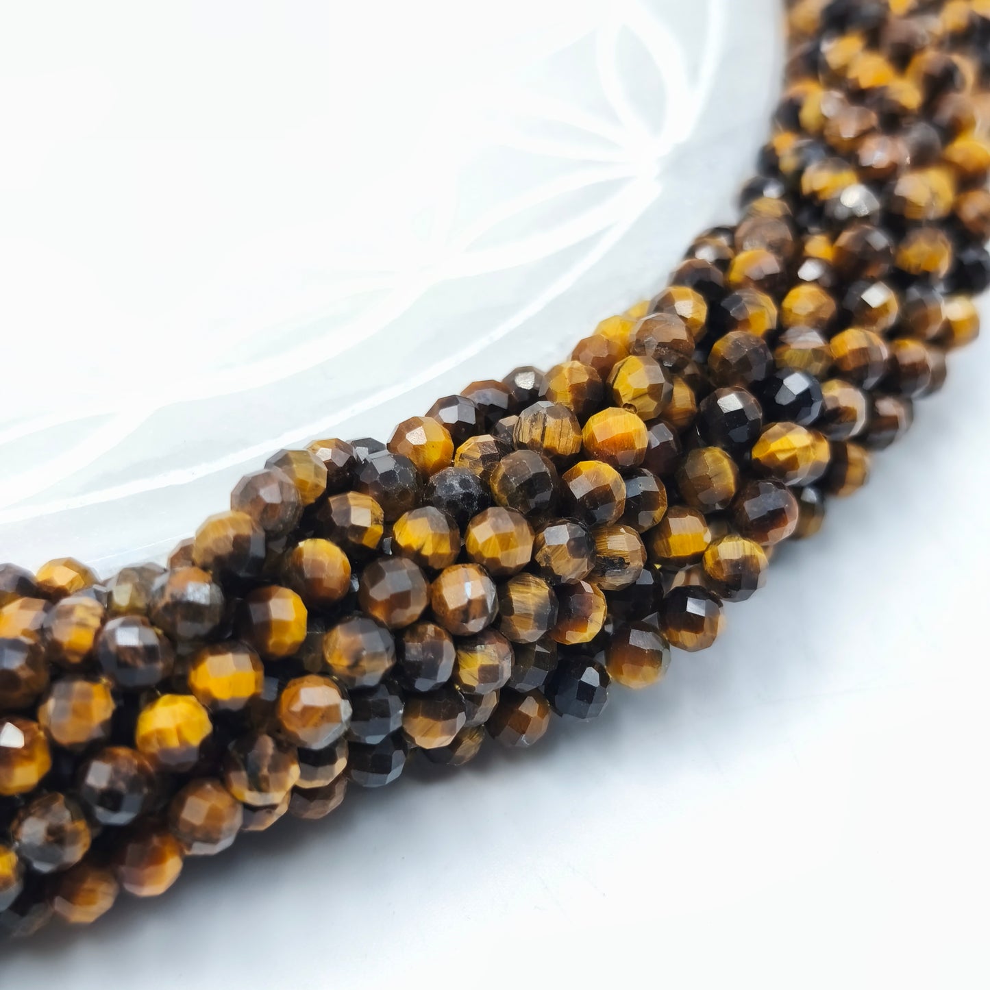 Rang facetté - Oeil de tigre (4 mm)