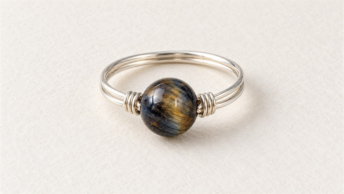 Bague double anneau en fil argenté : œil de faucon