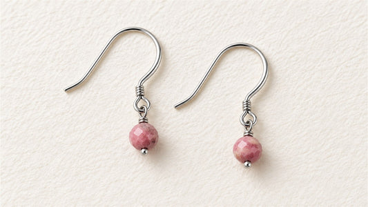 Boucles d’oreilles gouttes simples : rhodonite extra facettée