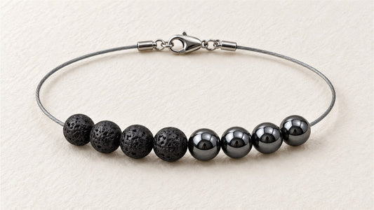 Bracelet câble souple et huit perles : pierre de lave et hématite