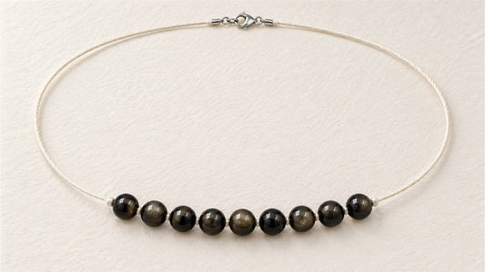 Collier soie nouée et ligne centrale : obsidienne dorée