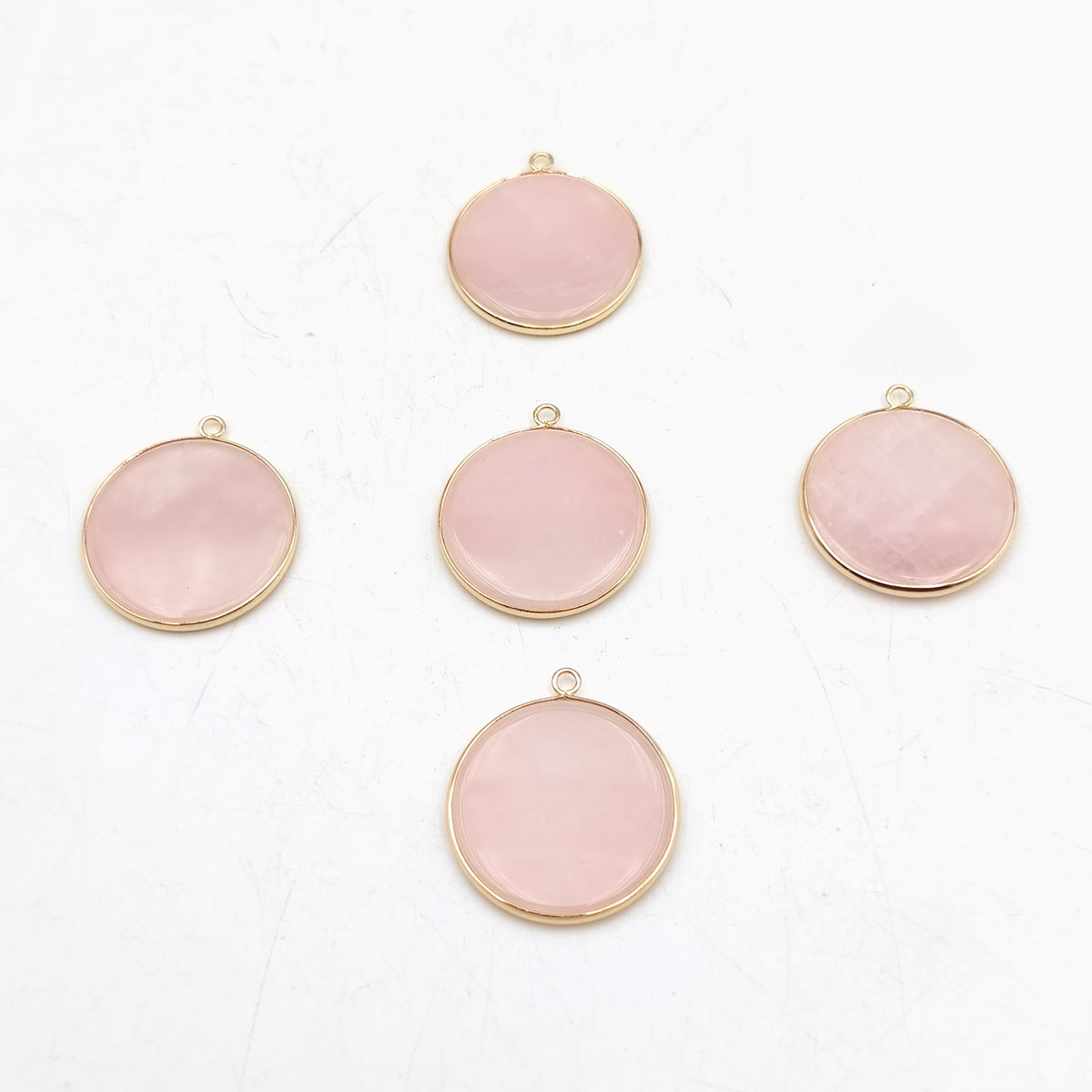 Pendentif rond serti Quartz rose