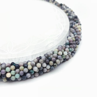 Rang de perles facettées - Emeraude sur quartz (4 mm)