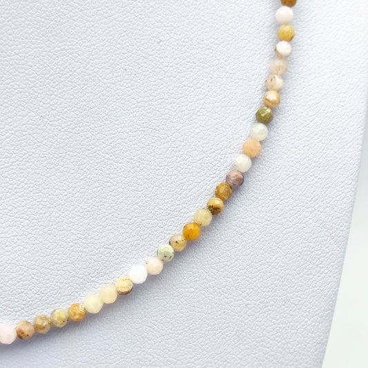 Collier perles facettées - Opale rose (3 mm)