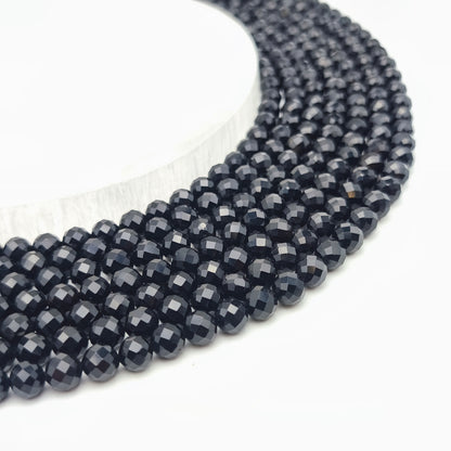 Rang de perles facettées - Onyx (8 mm)