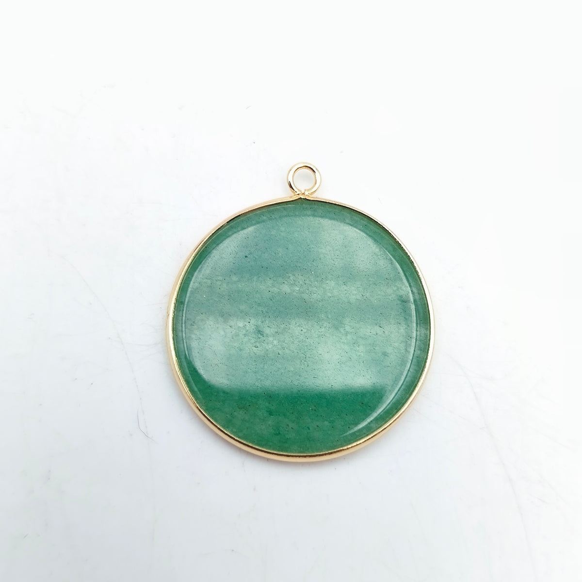 Pendentif rond serti Aventurine verte