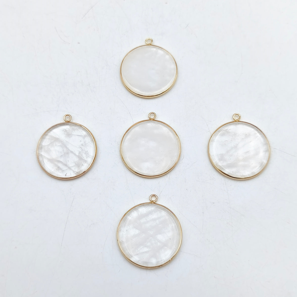 Pendentif rond serti Cristal de roche