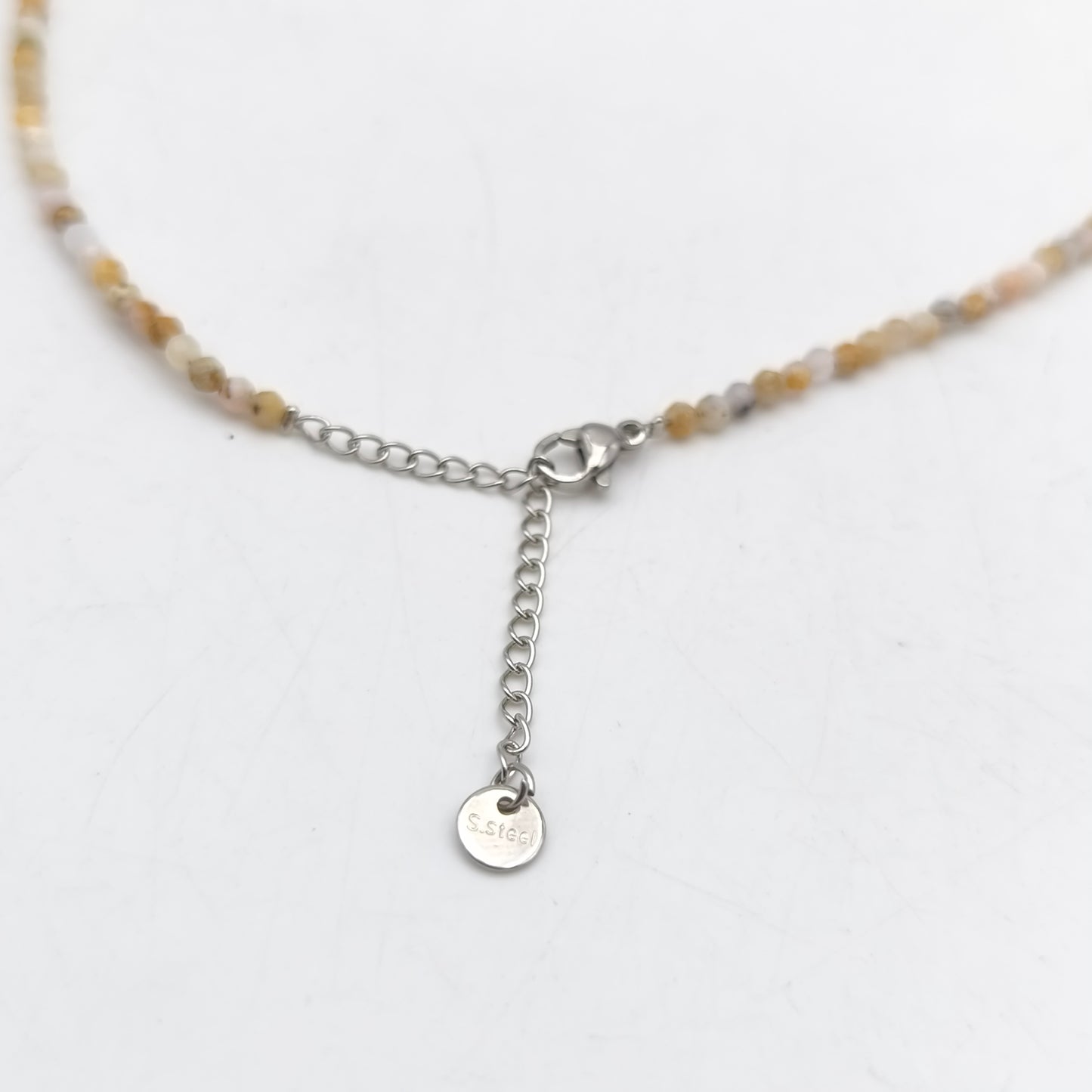 Collier perles facettées - Opale rose (3 mm)