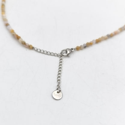 Collier perles facettées - Opale rose (3 mm)