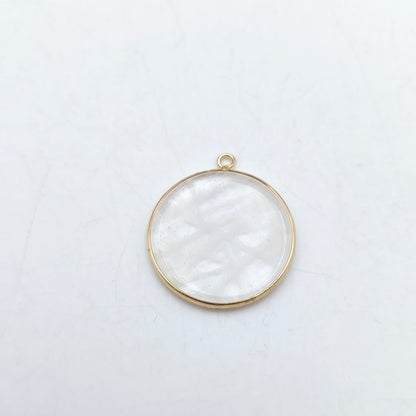 Pendentif rond serti Cristal de roche