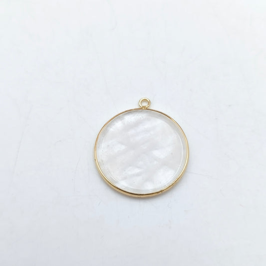 Pendentif rond serti Cristal de roche